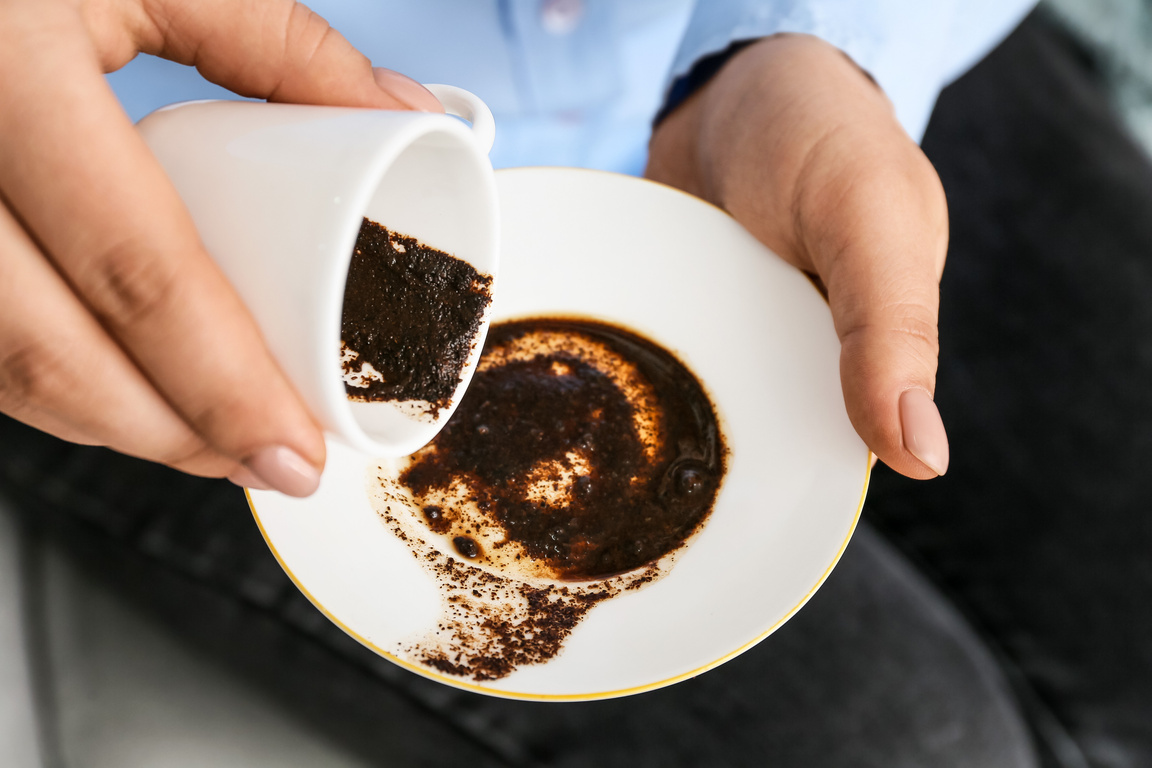 Woman Reading Coffee Grounds, Closeup