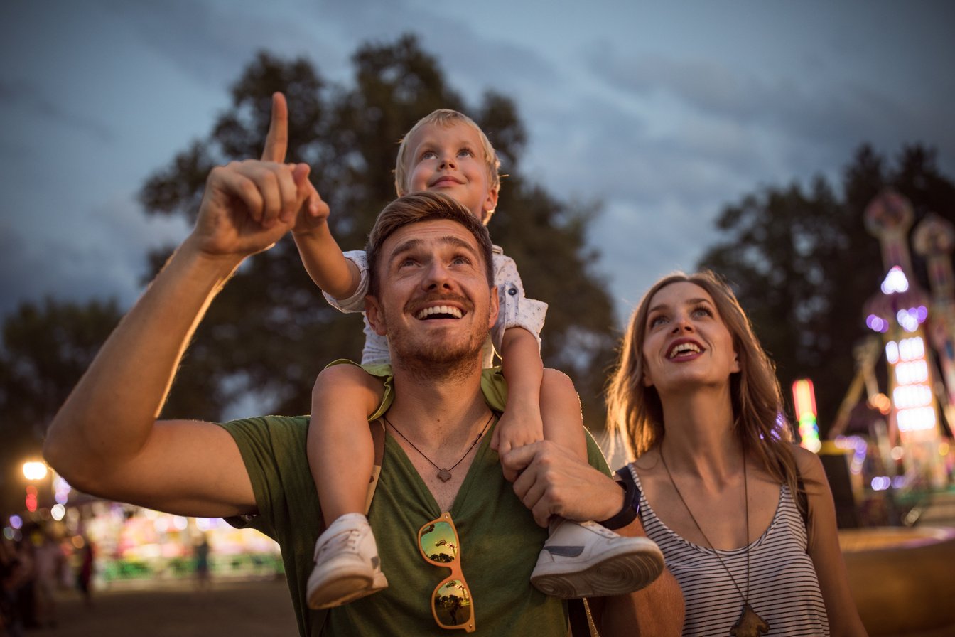 Family enjoy on summer festival